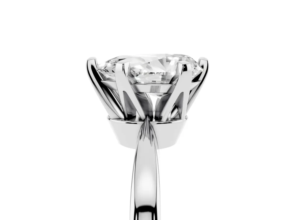 Pear Cut Solitaire Engagement Ring with Six-Prong Setting and Tapered Band Platinum