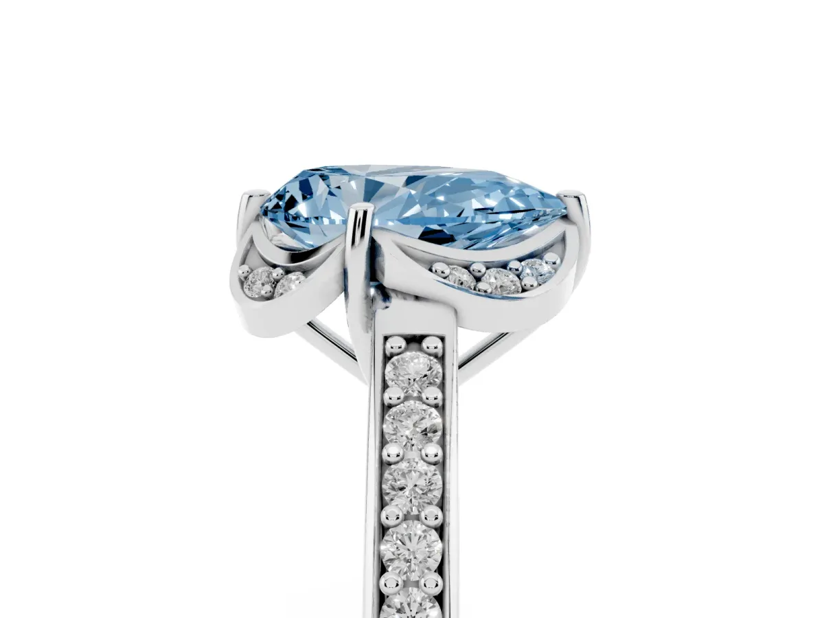 Fancy Blue Pear Cut Cut Halo Diamond Ring with Channel Set Band and Four-Prong Setting Silver