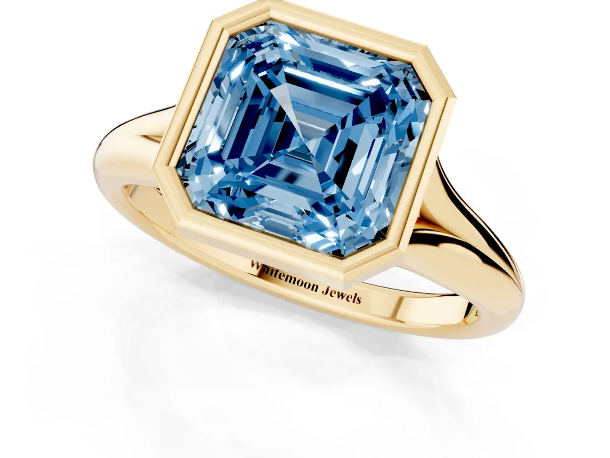 Fancy Blue Bezel Set Asscher Cut Solitaire Diamond Ring with Smooth Band Yellow gold