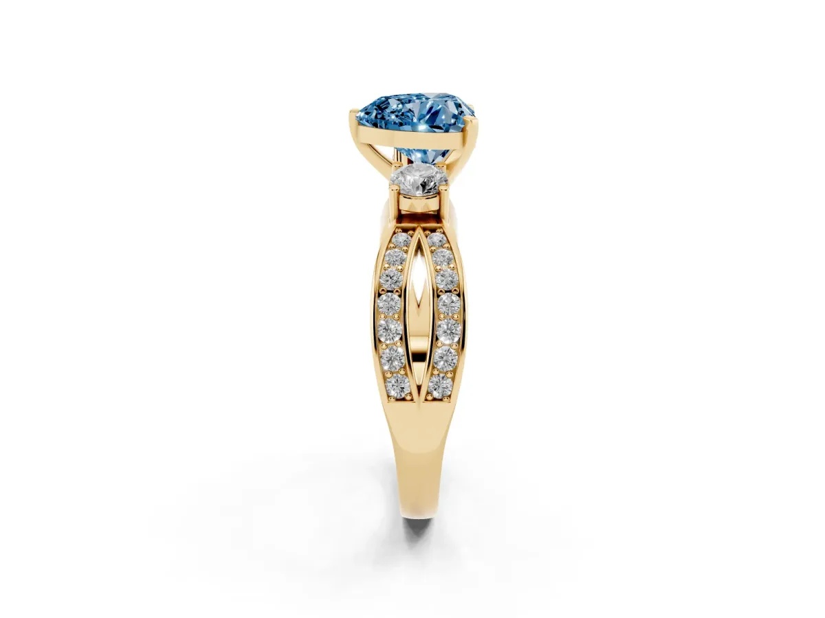 Fancy Blue Three-Stone Heart Cut Cut Diamond Twist Band with Prong Setting Yellow gold
