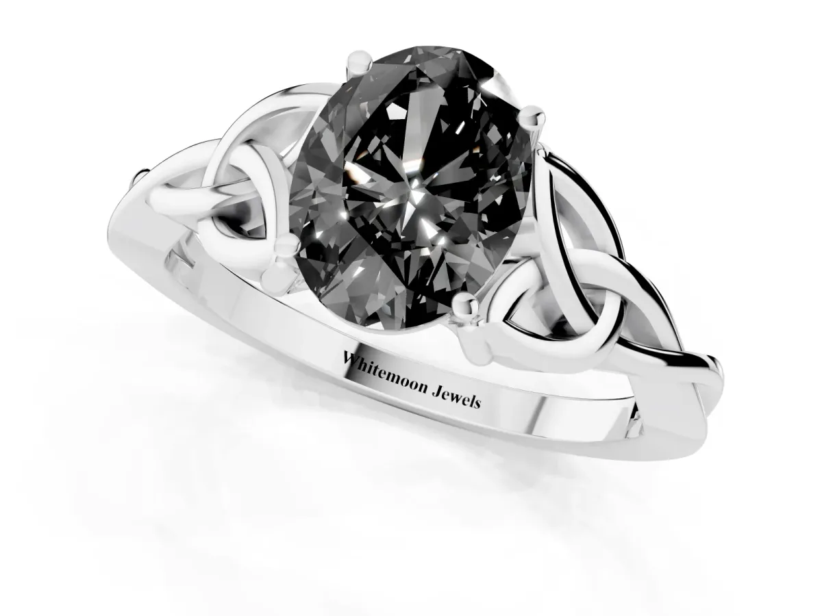 Fancy Black Oval Cut Diamond Solitaire Engagement Ring with Celtic Knot Band and Four-Prong Setting White gold