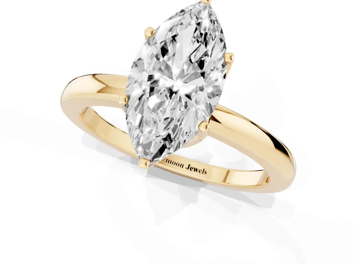 Marquise Cut Solitaire Diamond Ring with Six-Prong Setting on a Classic Band Yellow gold