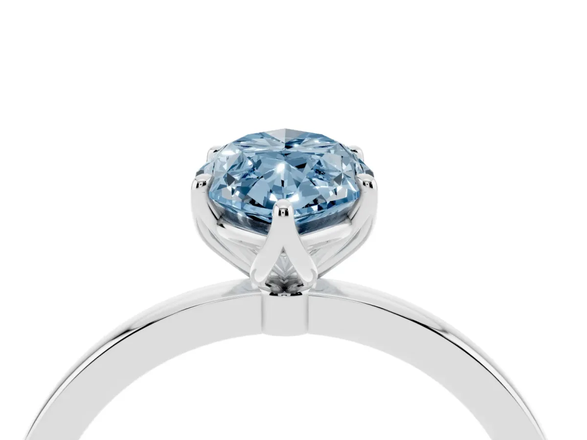Fancy Blue Marquise Cut Diamond Solitaire Ring with Thin Band and Prong Setting Platinum