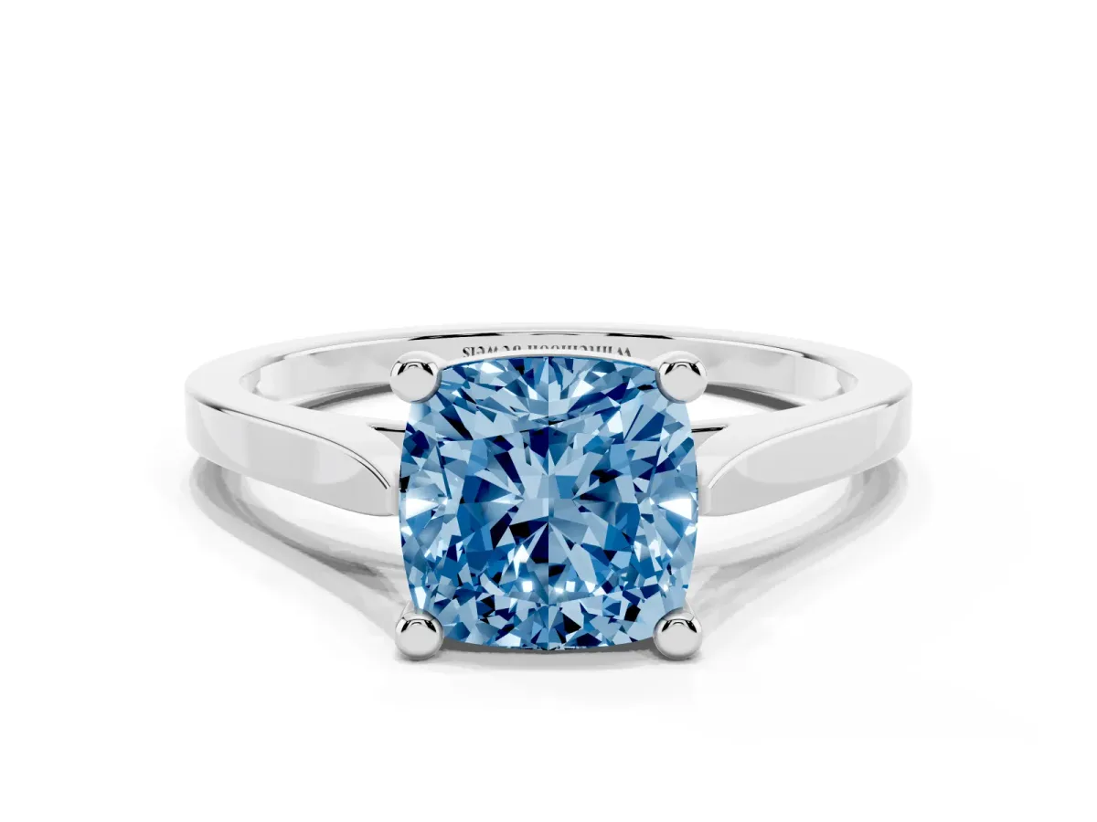 Fancy Blue Cushion Cut Solitaire Diamond Ring with Four-Prong Setting and Tapered Band Platinum