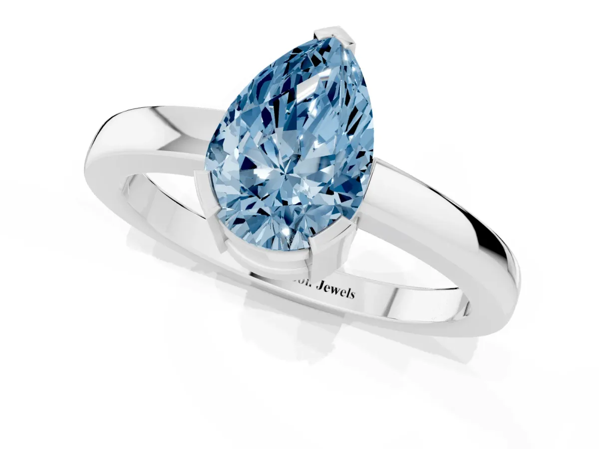 Fancy Blue Pear Cut Cut Solitaire Ring with Four-Prong Setting and Classic Band Platinum