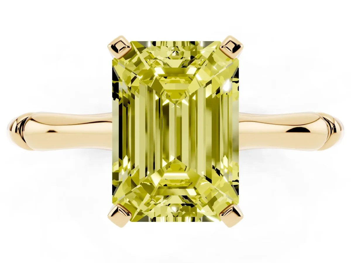 Fancy Yellow Emerald Cut Solitaire Diamond Ring with Bamboo Band and Four-Prong Setting Yellow gold