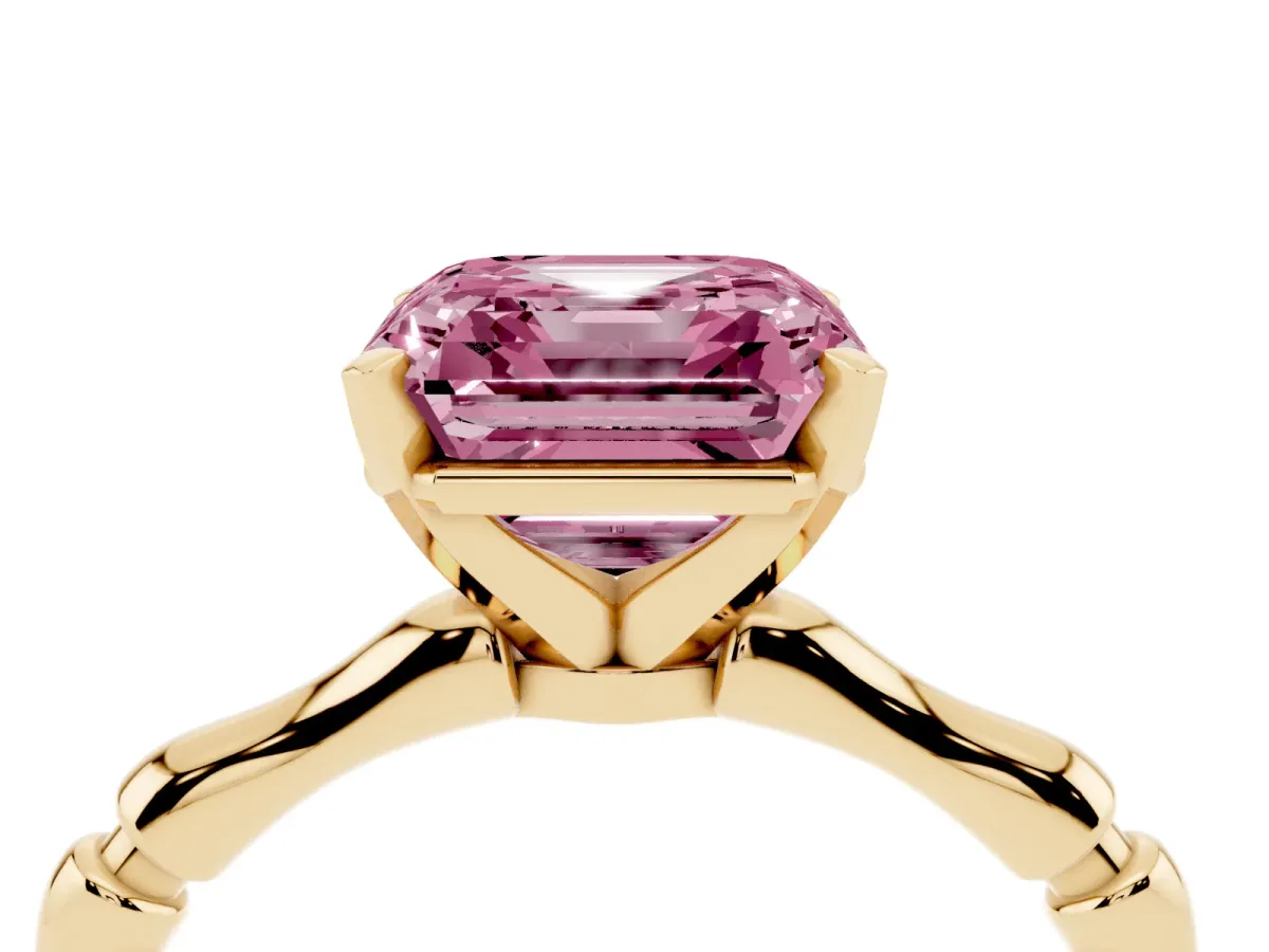 Fancy Pink Asscher Cut Solitaire Diamond Ring with Bamboo Band and Four-Prong Setting Yellow gold