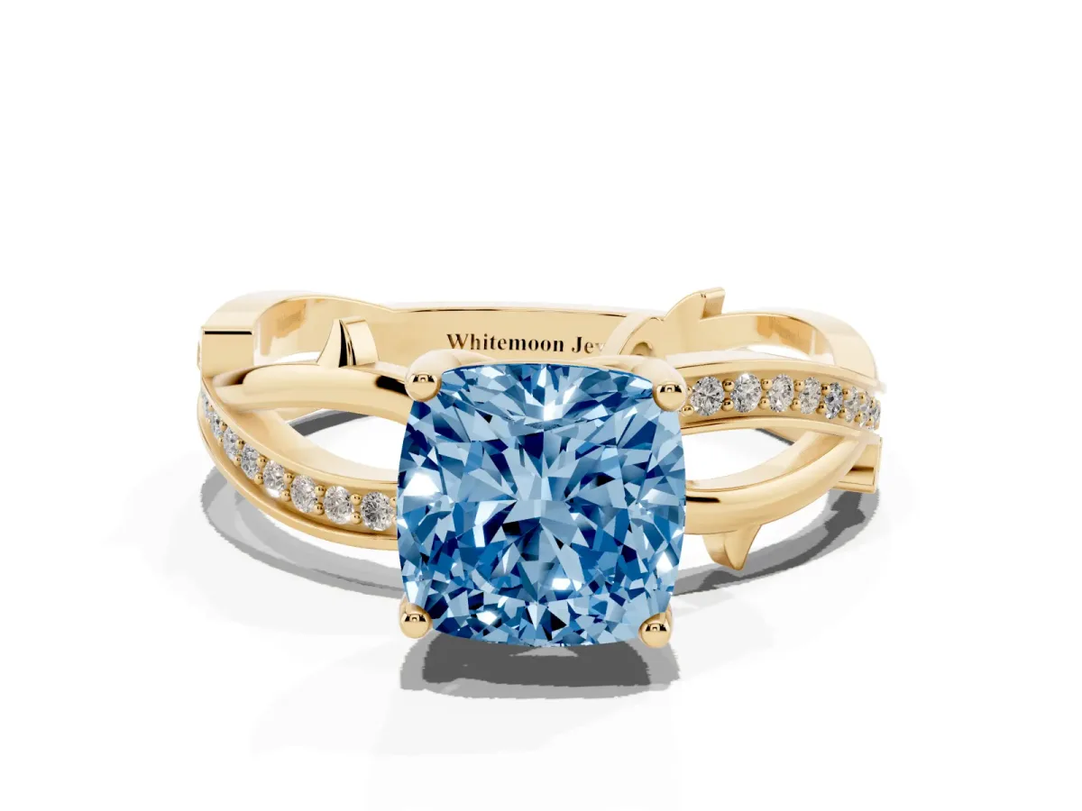 Fancy Blue Cushion Cut Solitaire Twist Band with Pavé Accents and Four-Prong Setting Yellow gold