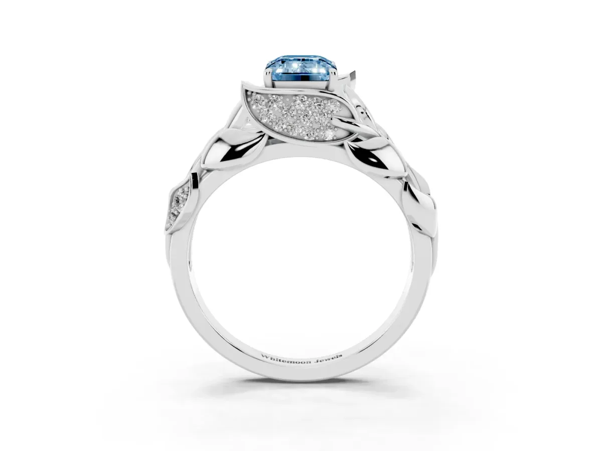 Fancy Blue Emerald Cut Diamond Leaf-Inspired Engagement Ring with Round Accents and Prong Setting Silver