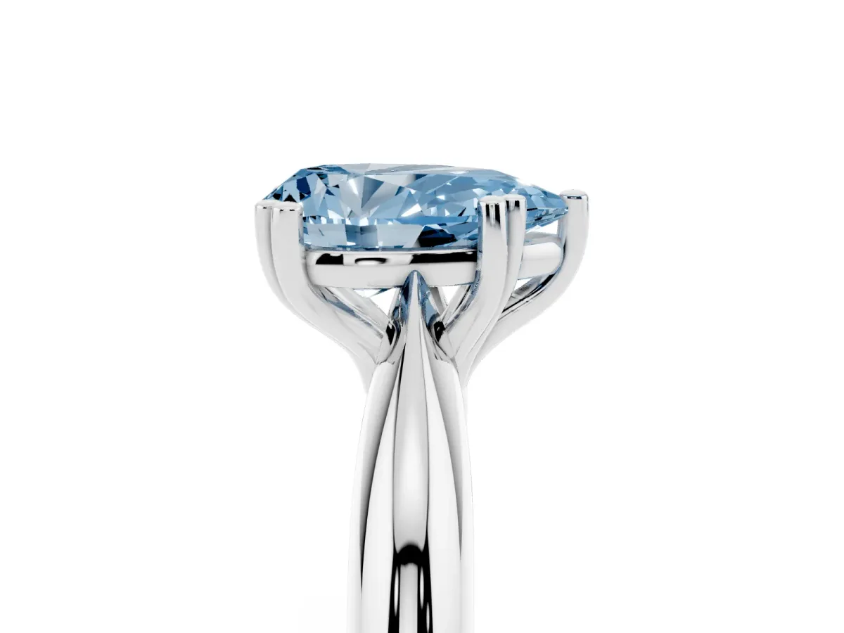 Fancy Blue Pear Cut Cut Solitaire Engagement Ring with Tapered Band and Four-Prong Setting White gold
