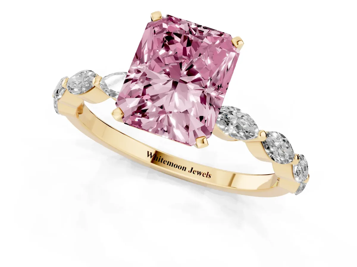 Fancy Pink Radiant Cut Diamond Ring with Marquise Side Stones and Prong Setting Yellow gold