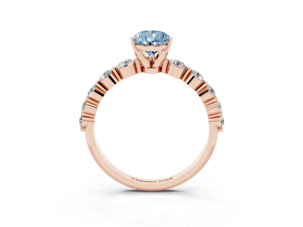 Fancy Blue Pear Cut Solitaire Diamond Ring with Pave Band and Four-Prong Setting Rose gold