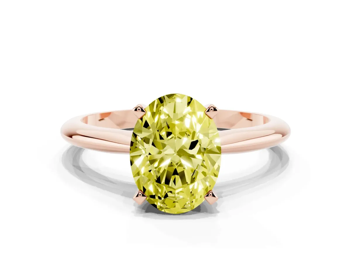 Fancy Yellow Oval Cut Cut Solitaire Ring with Four-Prong Setting on a Classic Band Rose gold