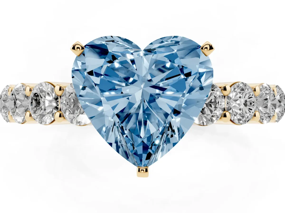 Fancy Blue Heart Cut Diamond Solitaire Ring with Shared Prong Round Side Stones Yellow gold
