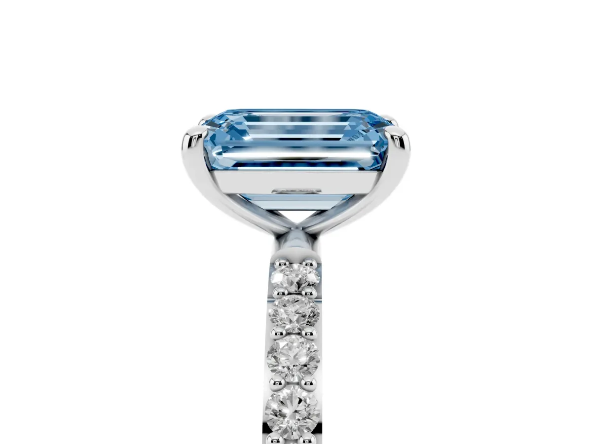 Fancy Blue Emerald Cut Diamond Solitaire Ring with Round Pavé Band and Prong Setting Silver