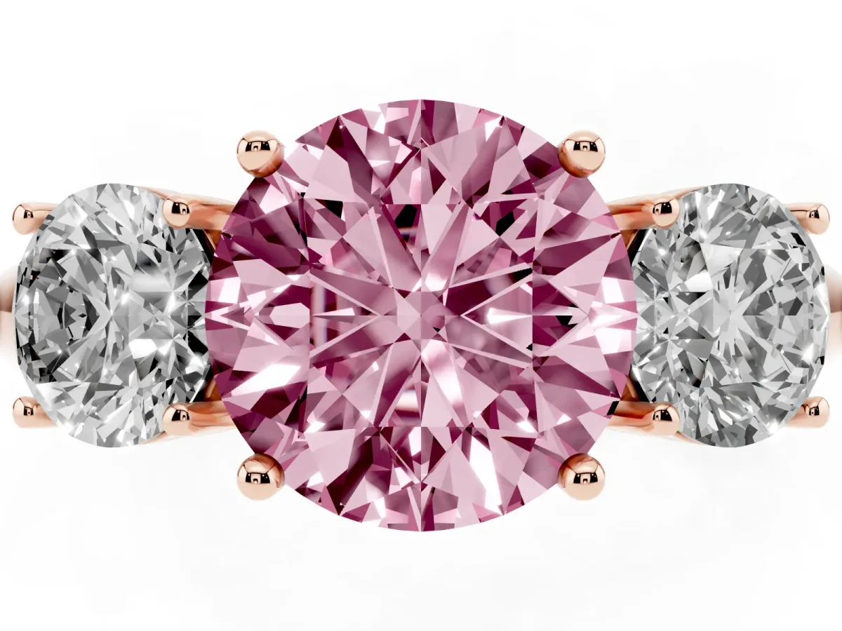 Fancy Pink Three-Stone Round Cut Cut Diamond Engagement Ring with Prong Setting on a White Gold Band Rose gold