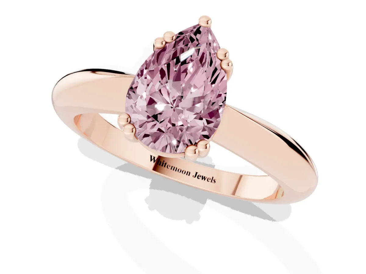 Fancy Pink Pear Cut Cut Solitaire Engagement Ring with Tapered Band and Four-Prong Setting Rose gold