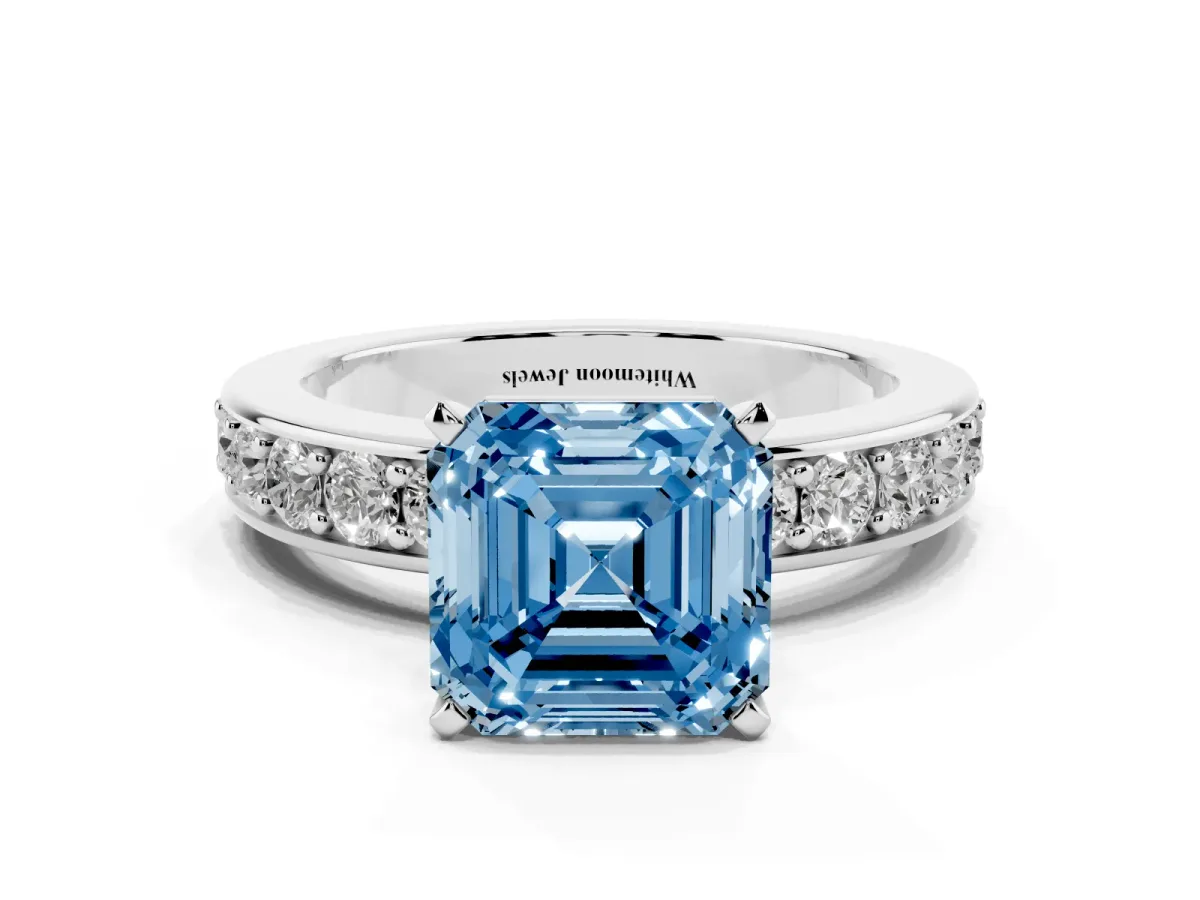 Fancy Blue Asscher Cut Diamond Engagement Ring with Channel Set Round Band and Prong Setting Silver