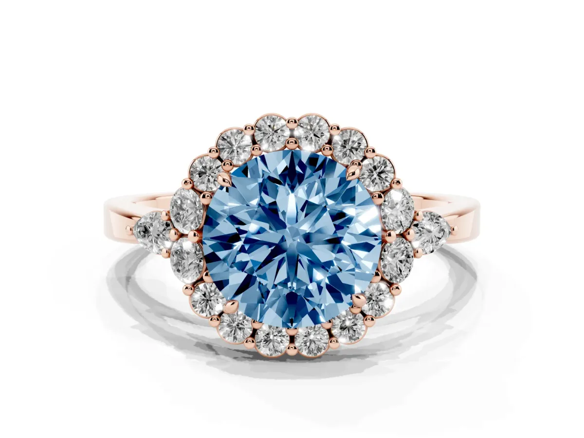Fancy Blue Round Cut Diamond Halo Ring with Pear Side Stones and Prong Setting Rose gold