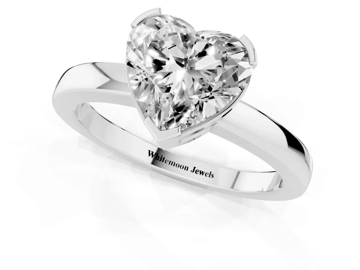 Heart Cut Cut Solitaire Ring with Four-Prong Setting and Classic Band Platinum