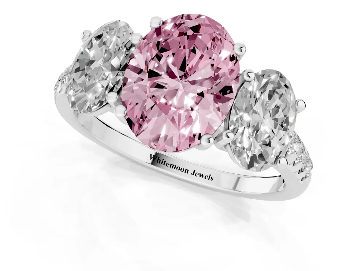 Fancy Pink Three-Stone Oval Cut Diamond Ring with Round Pavé Band and Prong Setting Silver