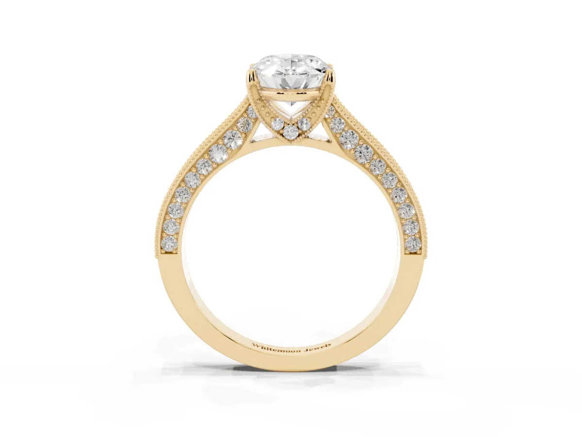 Oval Cut Cut Diamond Solitaire Ring with Milgrain Pave Band and Four Prong Setting Yellow gold