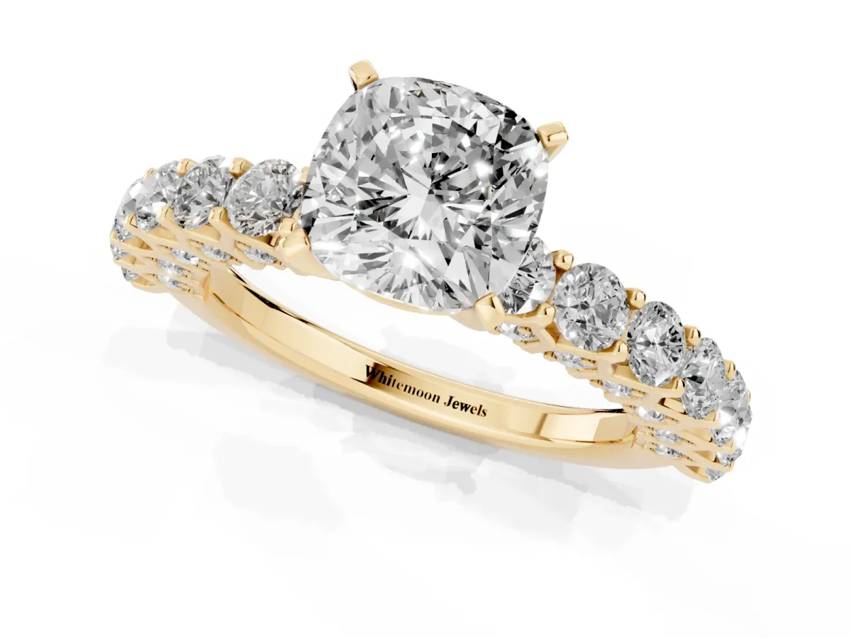 Cushion Cut Diamond Solitaire Ring with Shared Prong Pavé Band and Four-Prong Setting Yellow gold