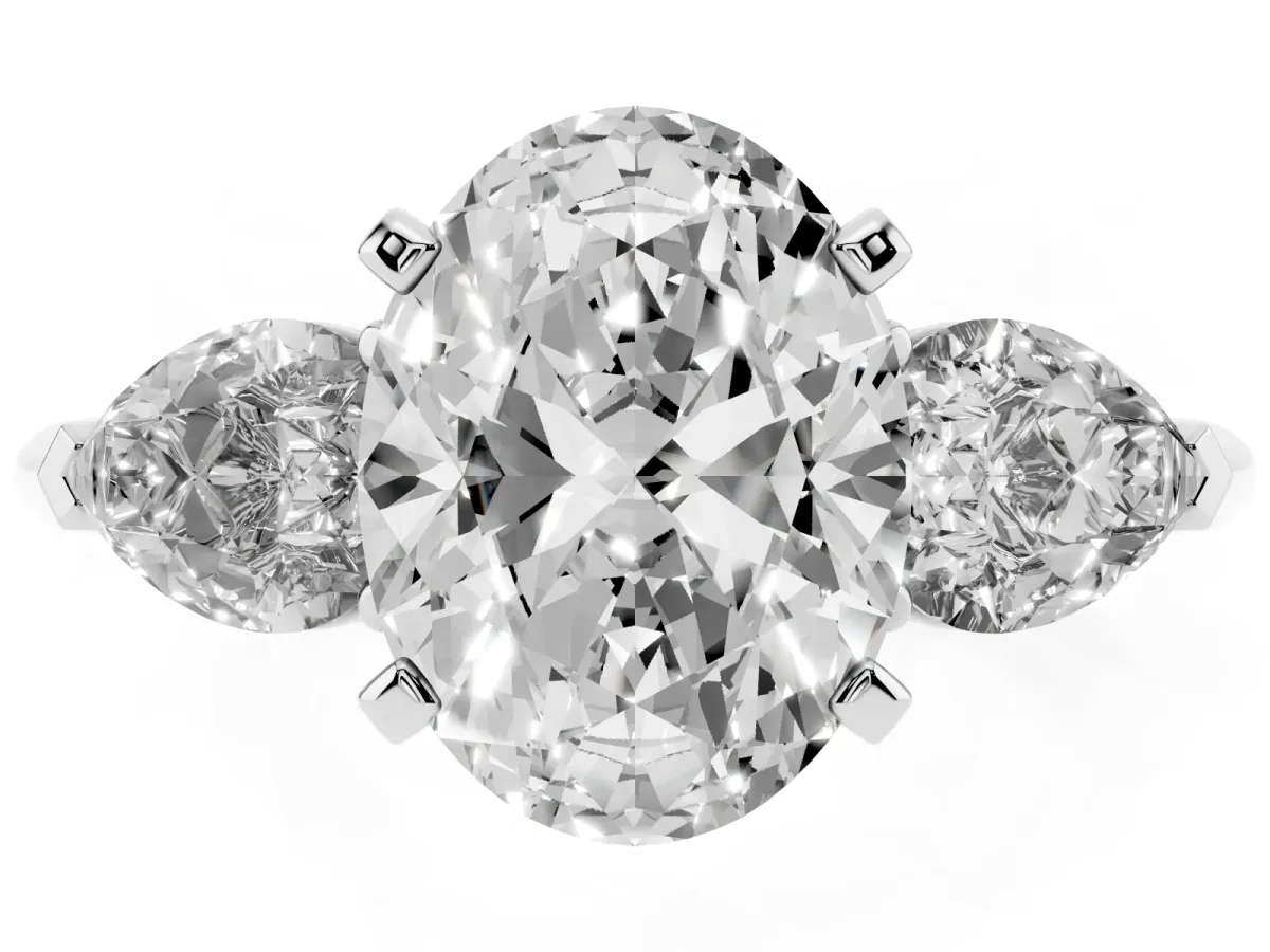 Three-Stone Oval Cut Diamond Ring with Pear Side Stones and Four-Prong Setting White gold
