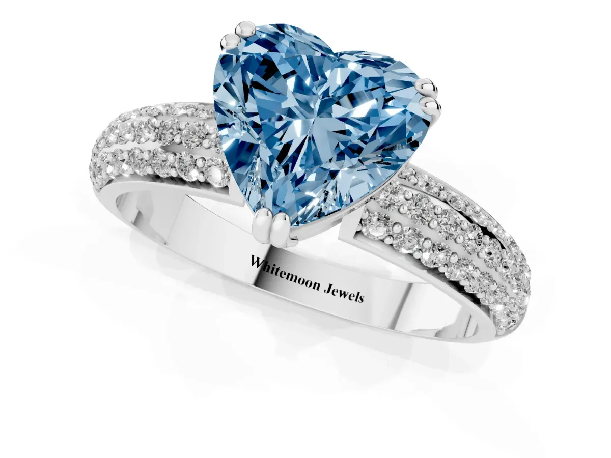 Fancy Blue Heart Cut Diamond Solitaire Ring with Multi-Row Round Pavé Band and Prong Setting Silver