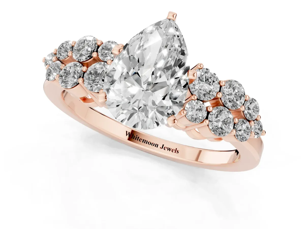Pear Cut Cluster Diamond Engagement Ring with Pavé Band and Four-Prong Setting Rose gold