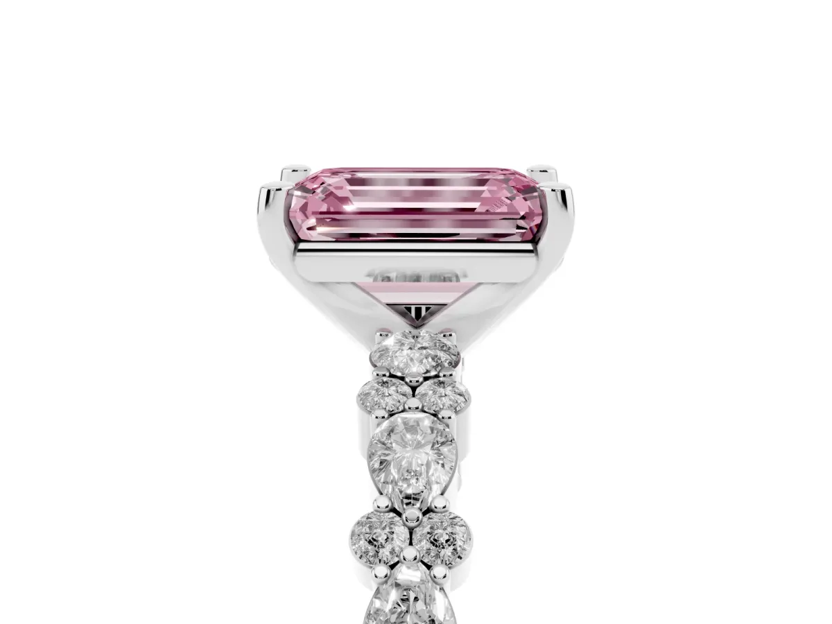 Fancy Pink Emerald Cut Diamond Side Stone Solitaire Ring with Round and Four-Prong Setting Platinum