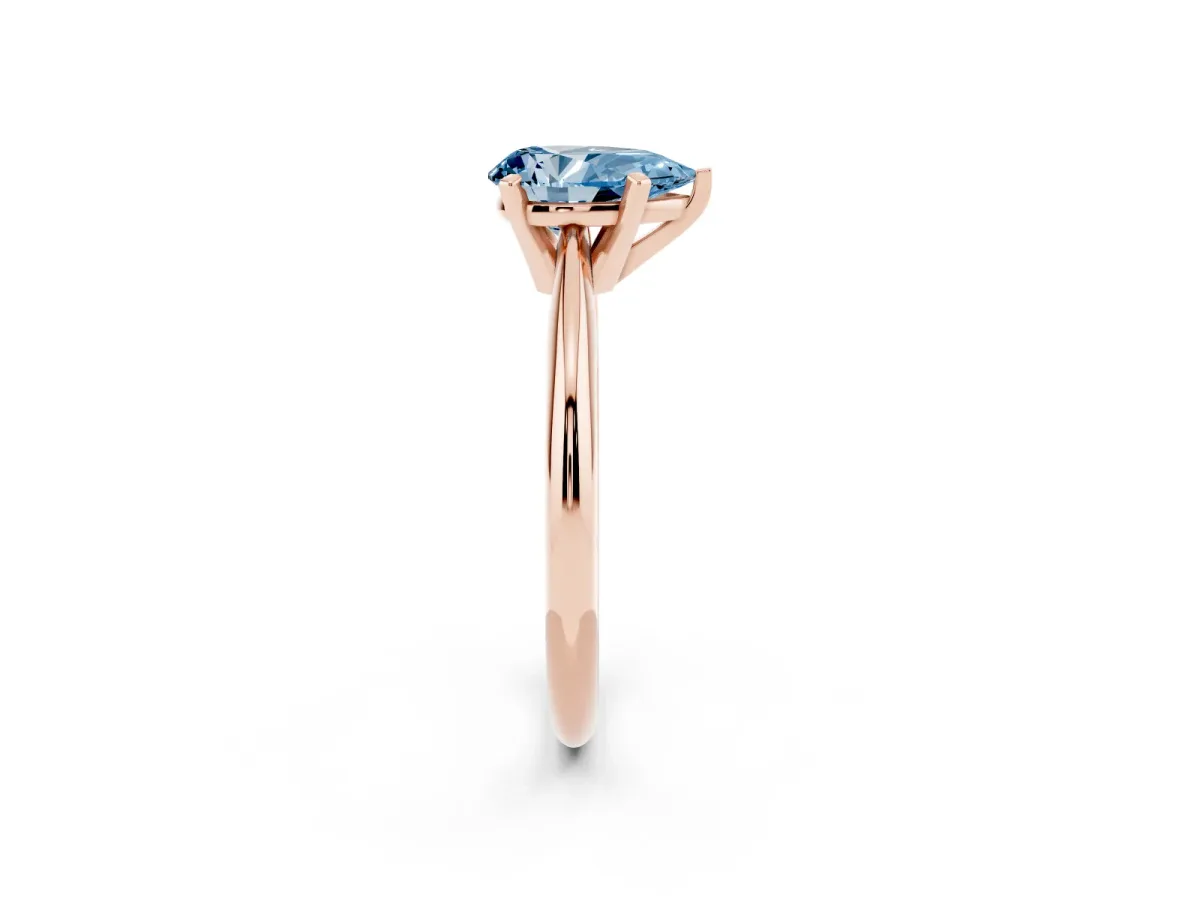 Fancy Blue Pear Cut Cut Solitaire Ring with Four-Prong Setting on a Classic Band Rose gold