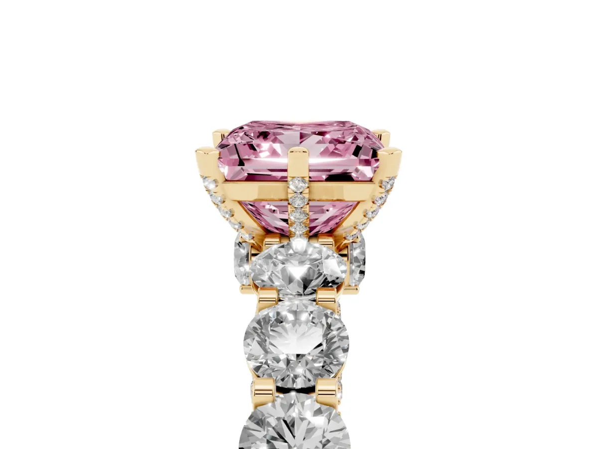 Fancy Pink Princess Cut Diamond Side Stone Engagement Ring with Four-Prong Setting Yellow gold