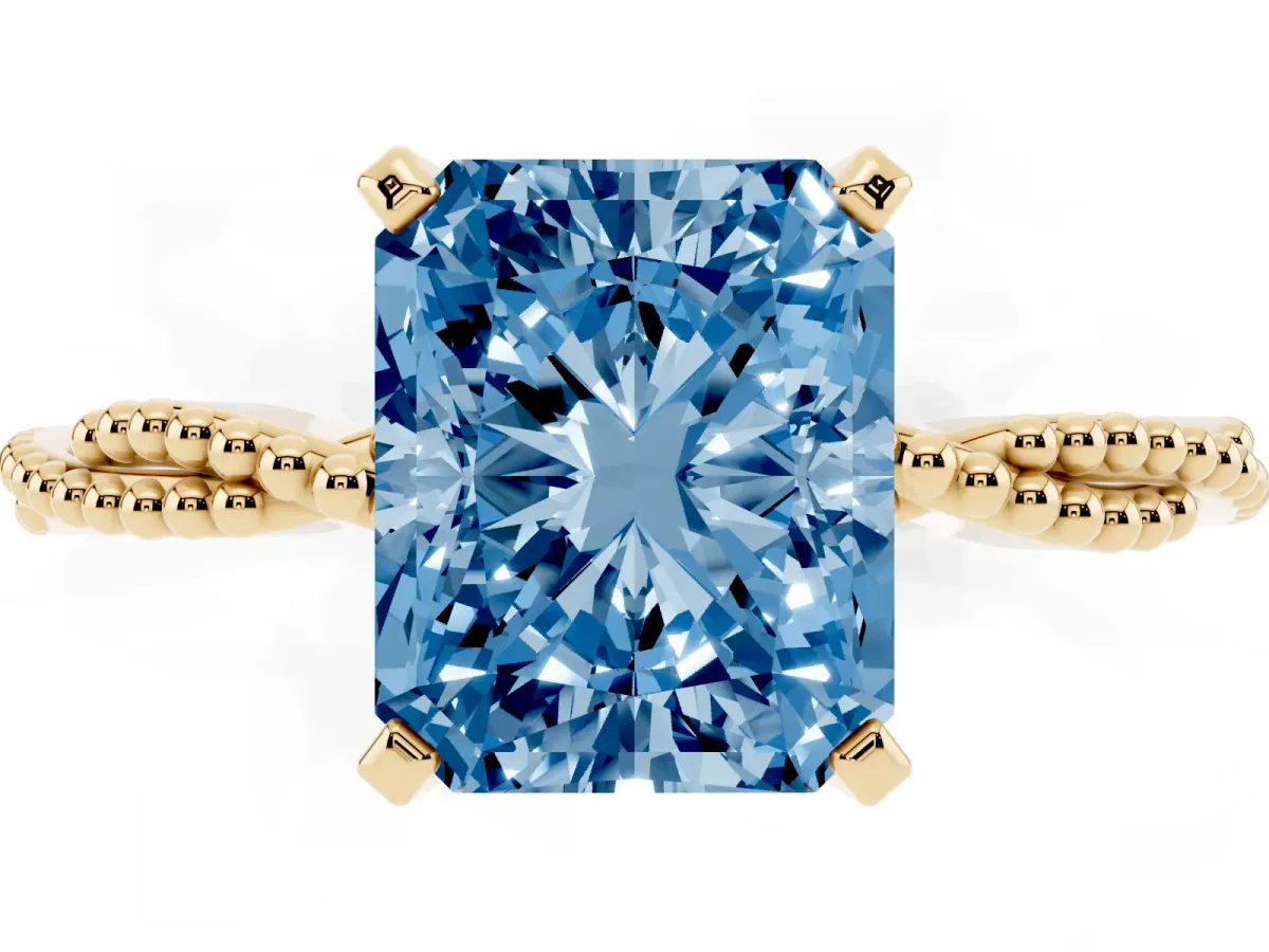 Fancy Blue Radiant Cut Solitaire Twisted Band with Bead Prong Setting Yellow gold