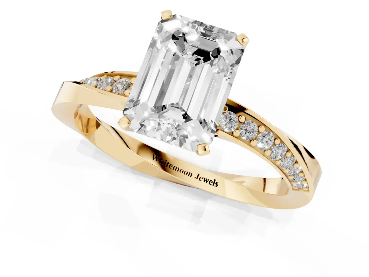 Emerald Cut Diamond Engagement Ring with Side Stone Accents and Four-Prong Setting Yellow gold