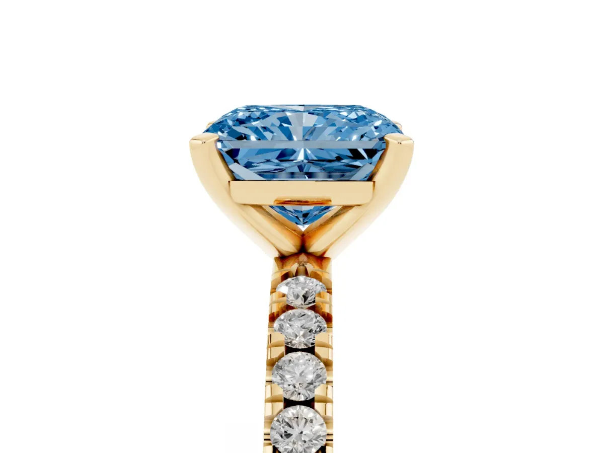 Fancy Blue Radiant Cut Diamond Pavé Band Solitaire with Four-Prong Setting Yellow gold