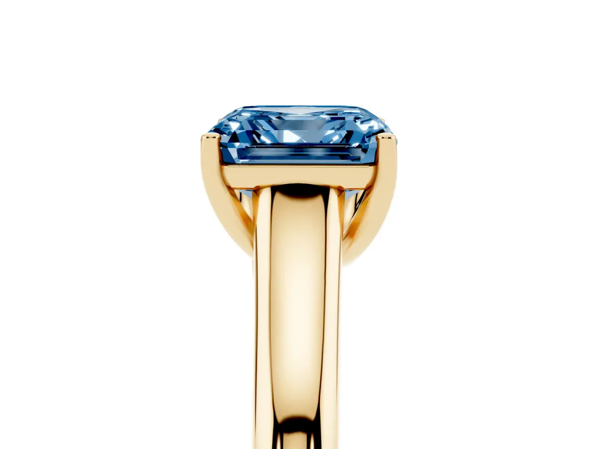 Fancy Blue Asscher Cut Solitaire Engagement Ring with Tapered Band and Four-Prong Setting Yellow gold