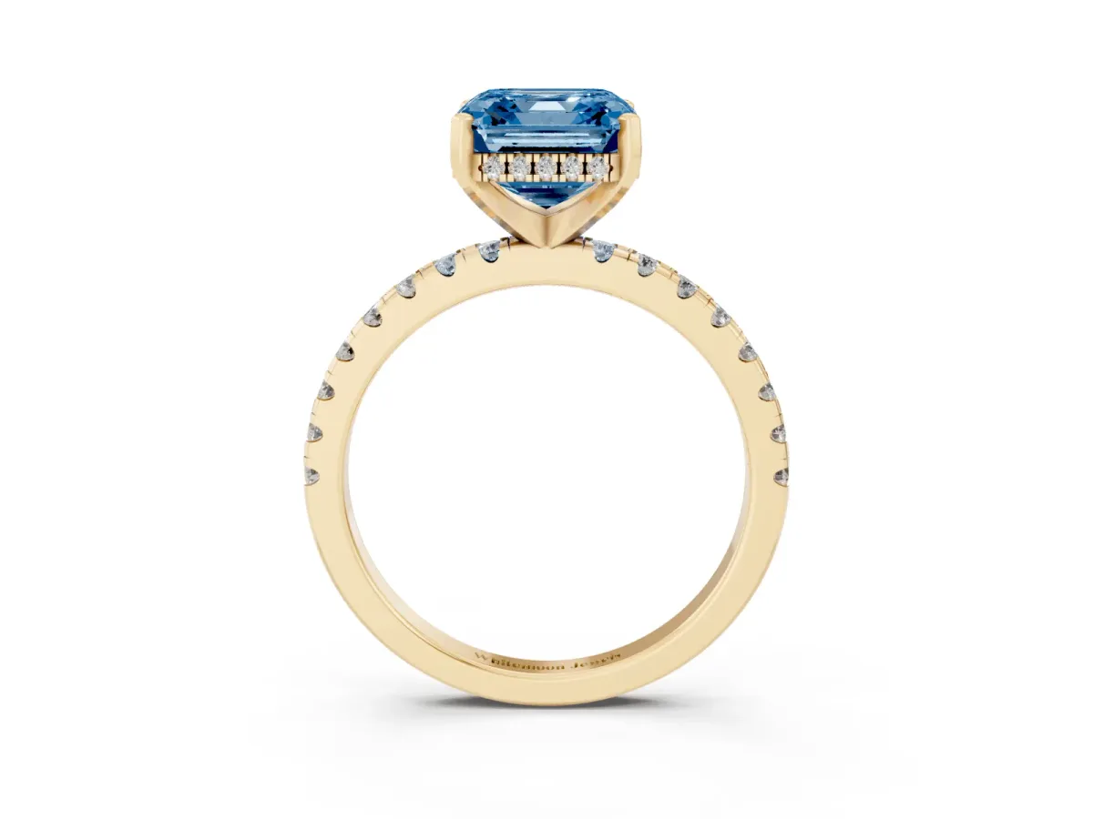 Fancy Blue Asscher Cut Diamond Solitaire Ring with Round Pavé Band and Four-Prong Setting Yellow gold