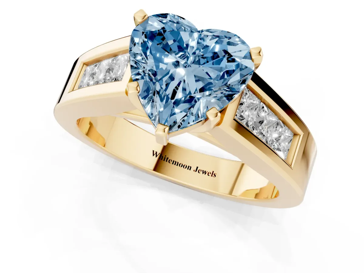 Fancy Blue Heart Cut Cut Channel Set Solitaire Ring with Four-Prong Setting Yellow gold