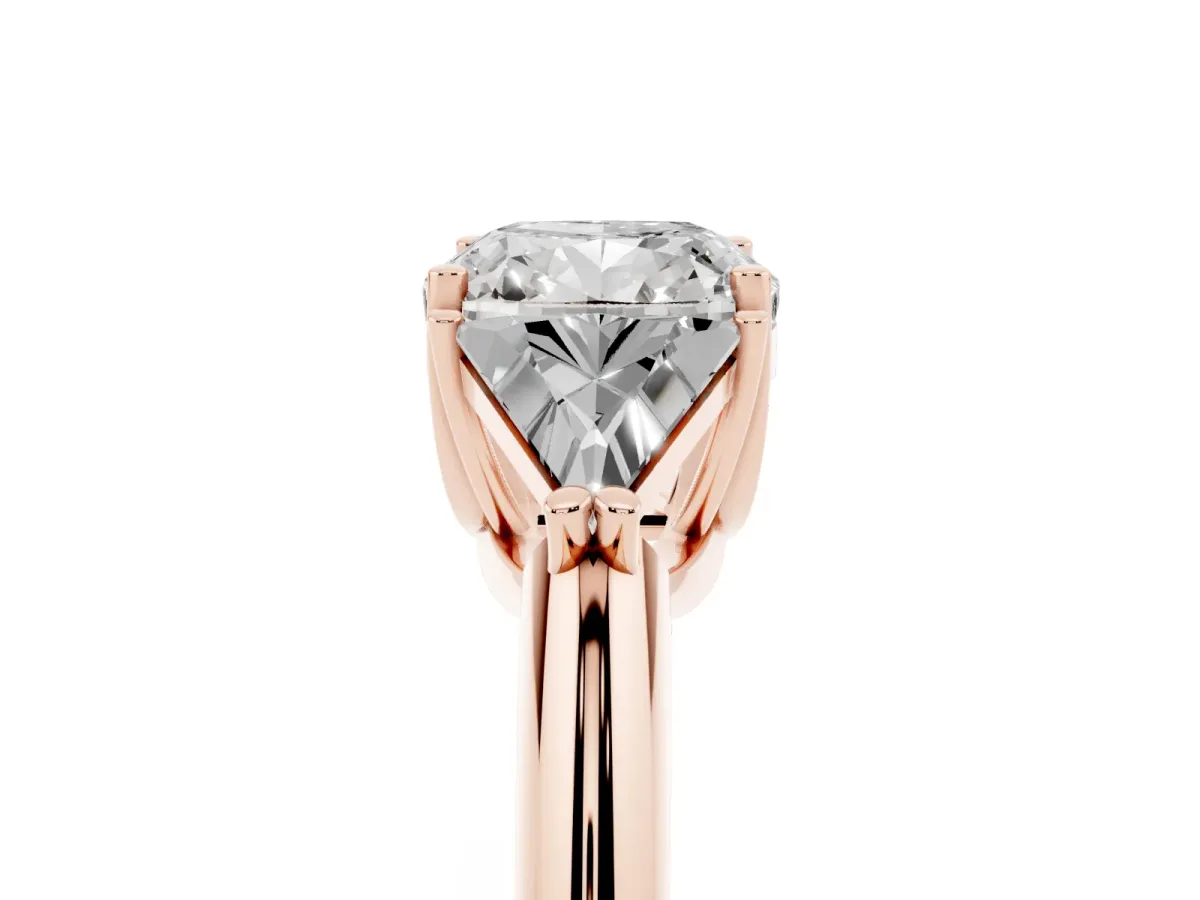 Three-Stone Cushion Cut Diamond Engagement Ring with Trillion Side Stones and Prong Setting Rose gold