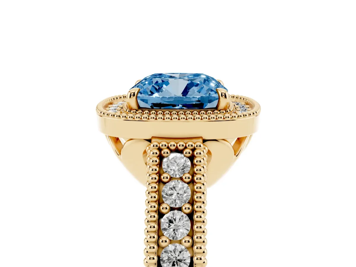 Fancy Blue Cushion Cut Cut Halo Diamond Ring with Pavé Band and Four-Prong Setting Yellow gold