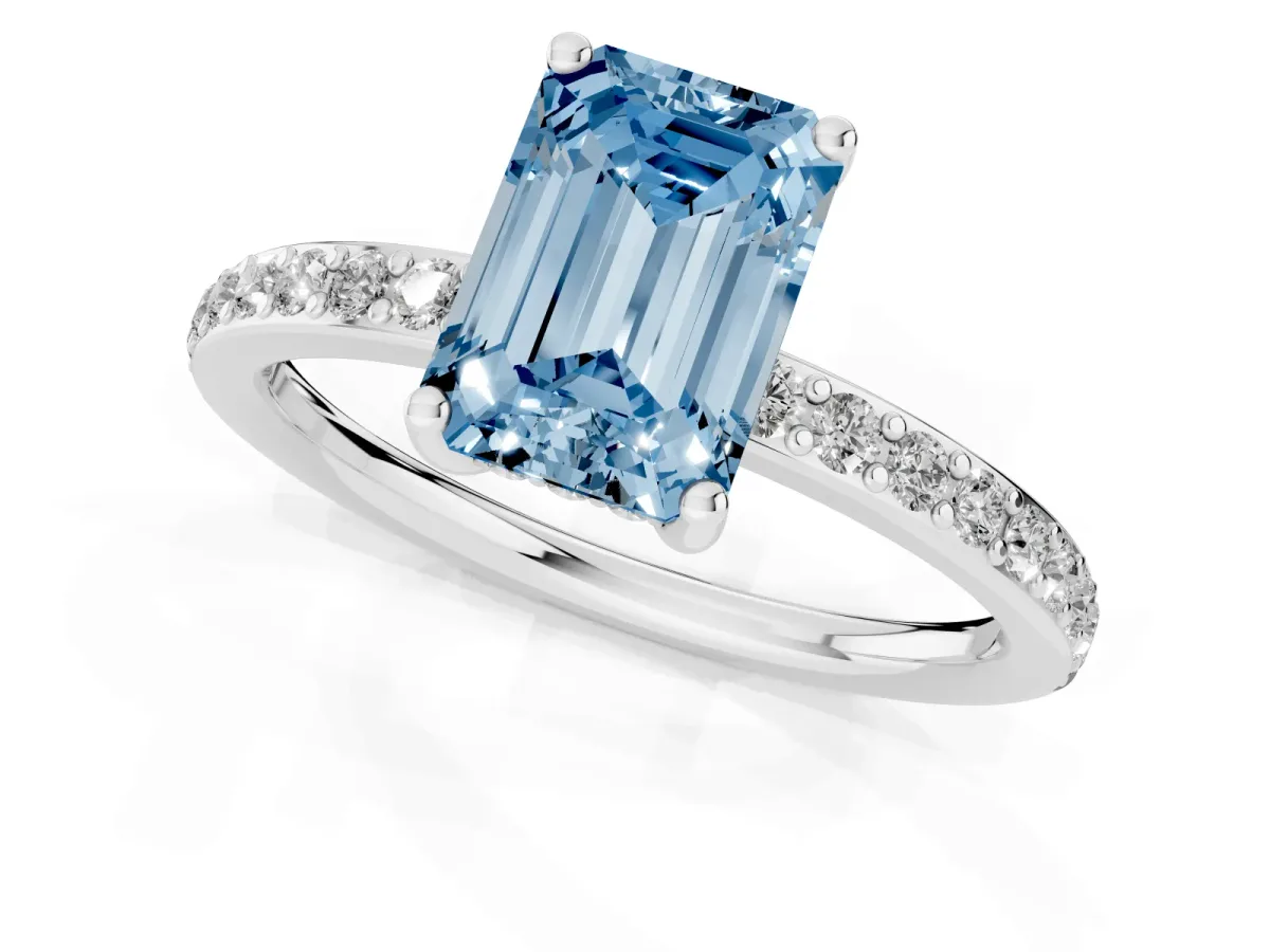 Fancy Blue Emerald Cut Cut Diamond Pavé Band Ring with Four-Prong Setting Platinum