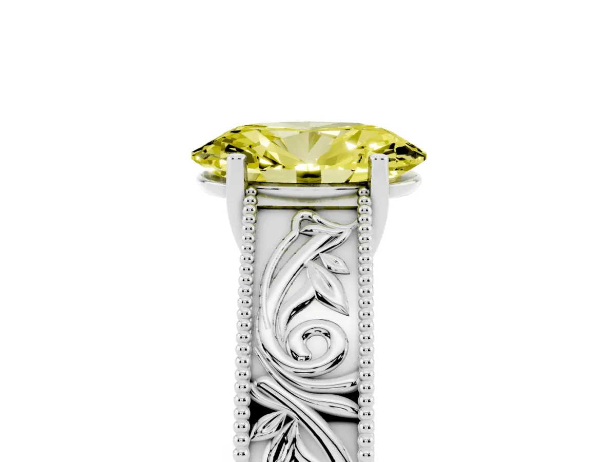 Fancy Yellow Oval Cut Diamond Solitaire Ring with Engraved Band and Four-Prong Setting Silver