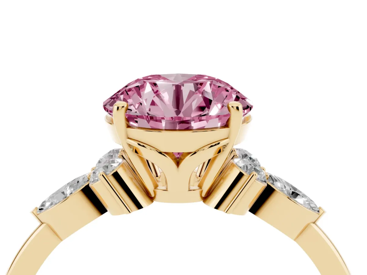 Fancy Pink Round Cut Brilliant Diamond Solitaire Ring with Pear Side Stones and Four-Prong Setting Yellow gold
