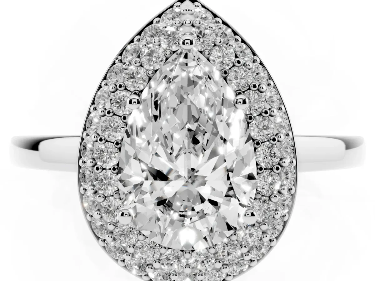 Pear Cut Halo Diamond Engagement Ring with Solitaire Band and Four-Prong Setting Silver