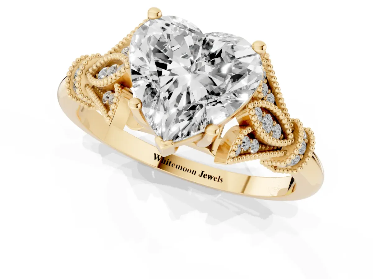 Heart Cut Diamond Solitaire Ring with Floral Filigree and Pave Accents Yellow gold