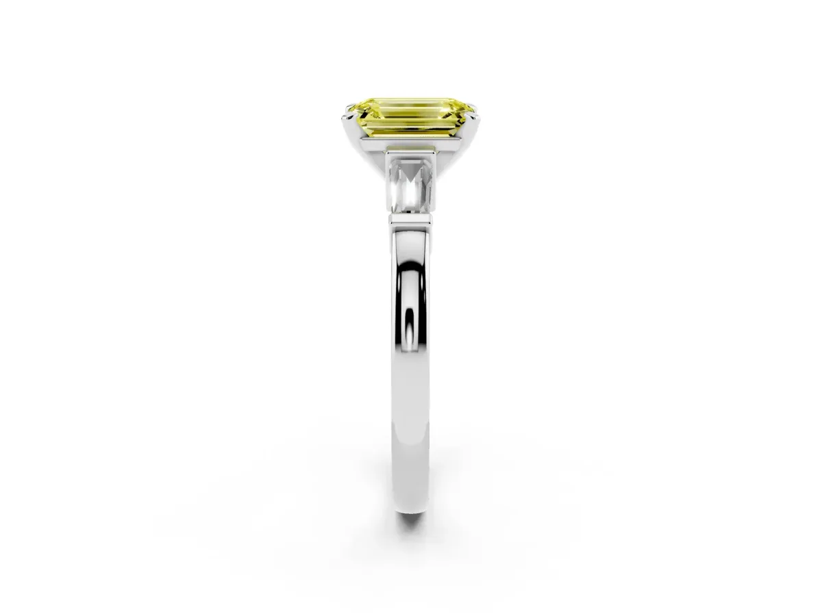 Fancy Yellow Emerald Cut Cut Diamond Solitaire Ring with Tapered Baguette Accents and Four-Prong Setting Silver