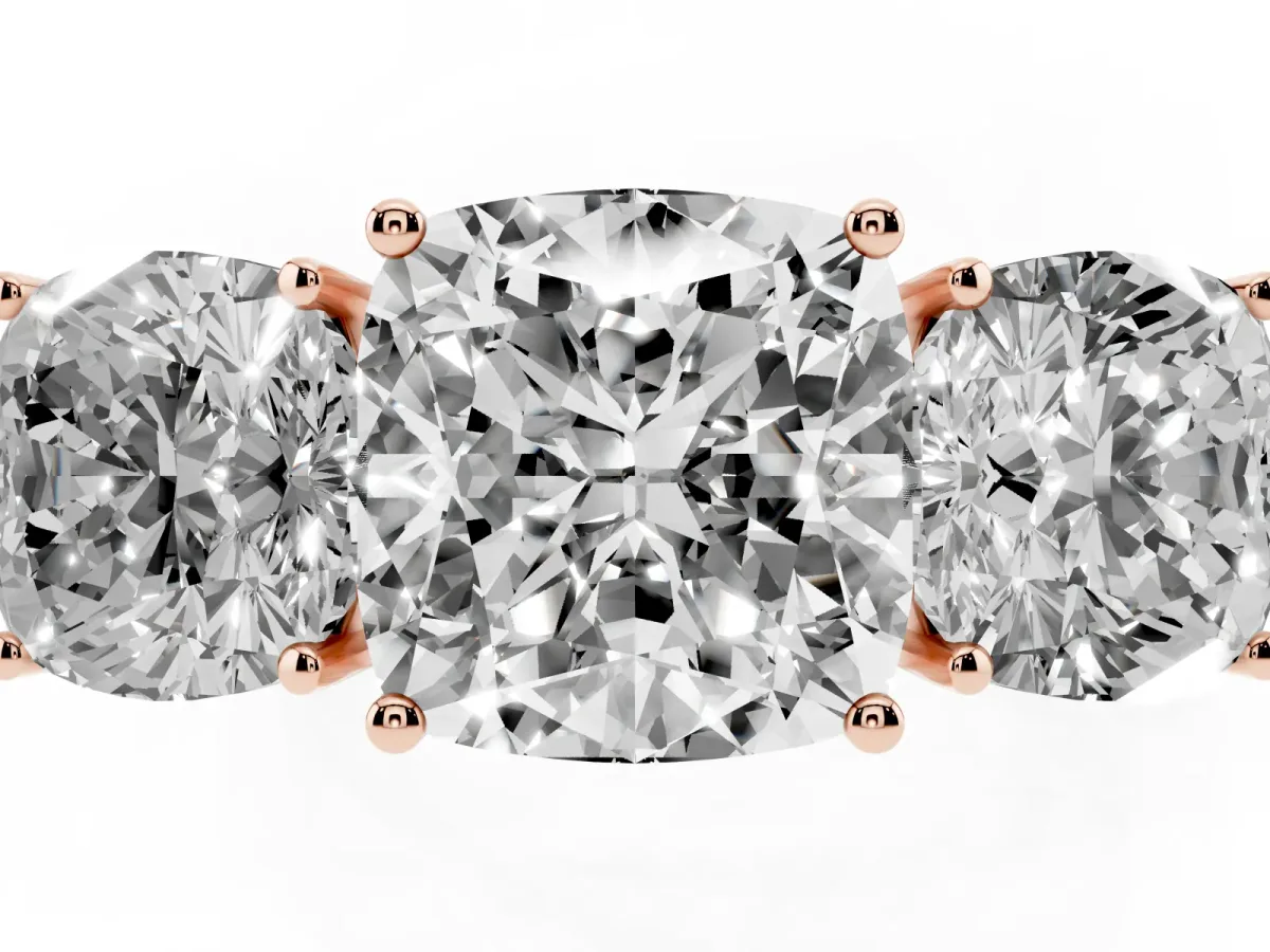 Cushion Cut Diamond Three-Stone Ring with Prong Setting and Textured Band Rose gold