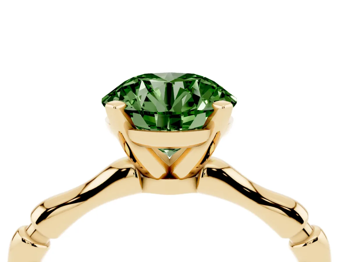 Fancy Green Round Cut Solitaire Diamond Ring with Bamboo Band and Four-Prong Setting Yellow gold
