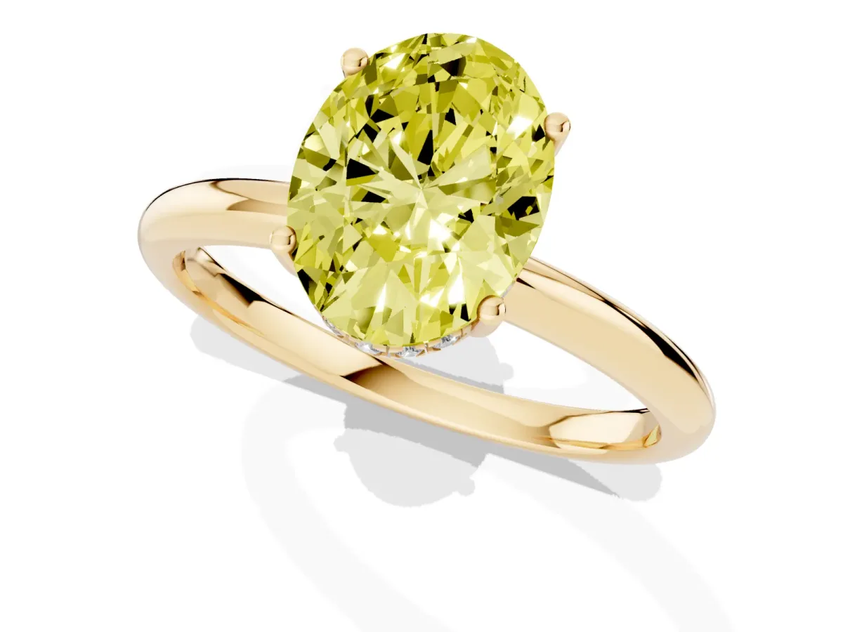 Fancy Yellow Oval Cut Cut Solitaire Engagement Ring with Four-Prong Setting and Classic Band Yellow gold